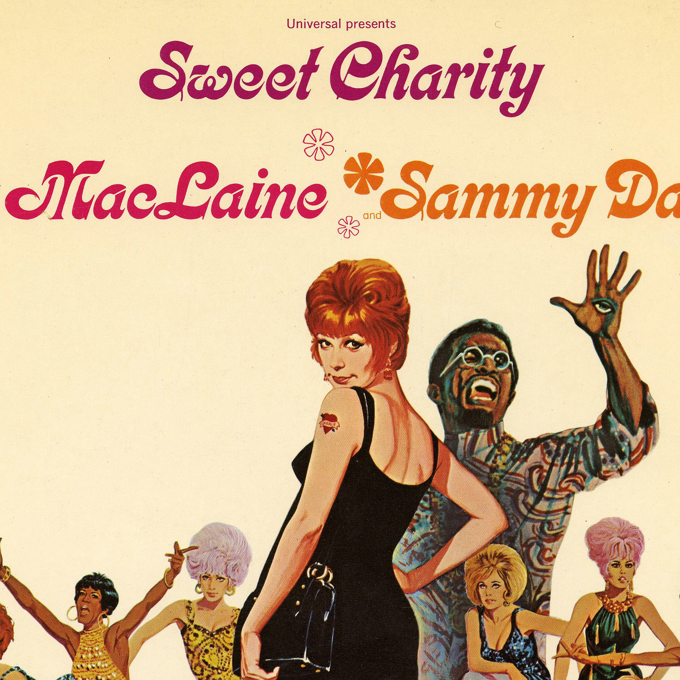 American actress Shirley MacLaine lifts her skirt in a scene from the